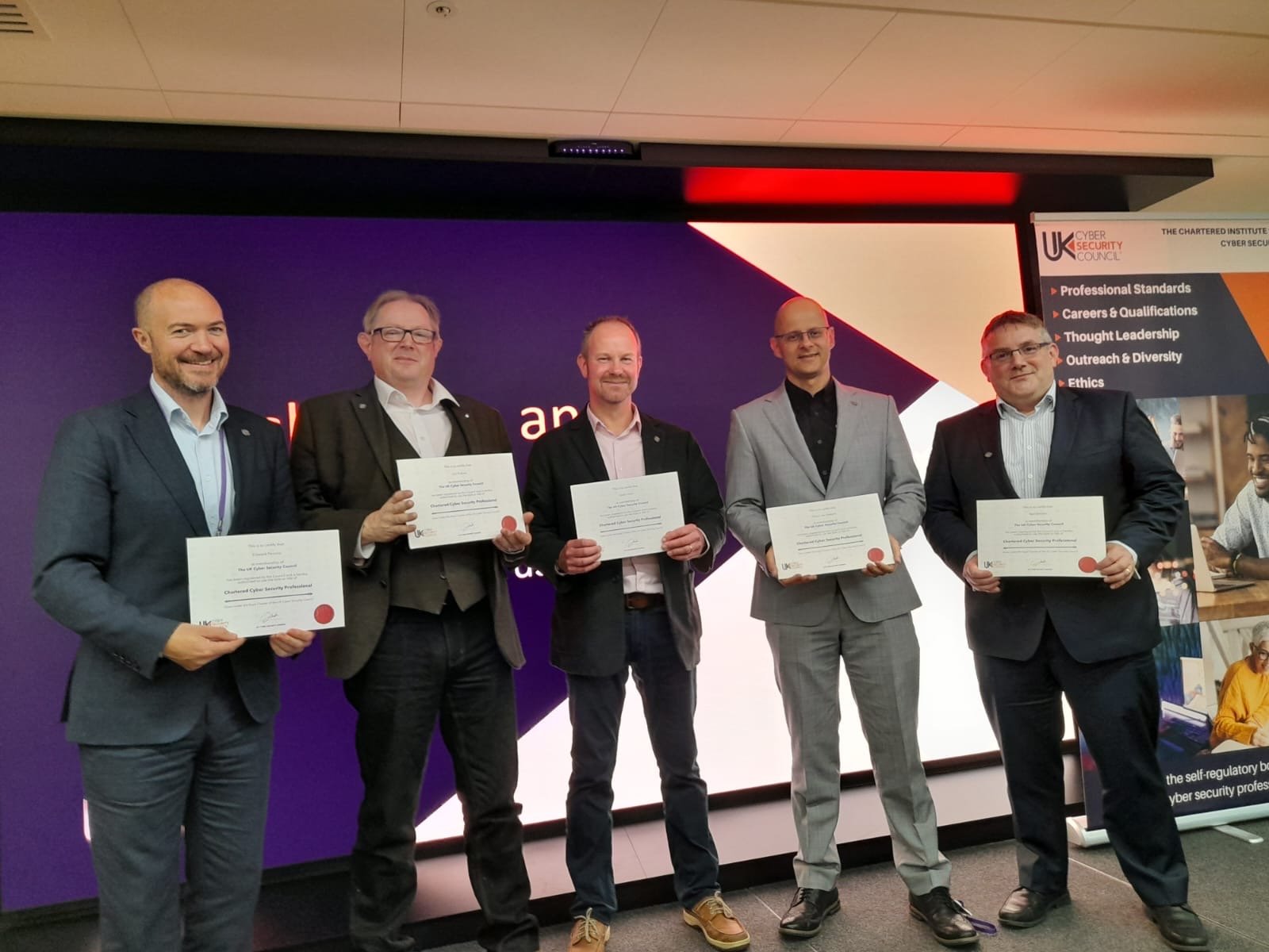 ISC2 members receiving their Chartered status.